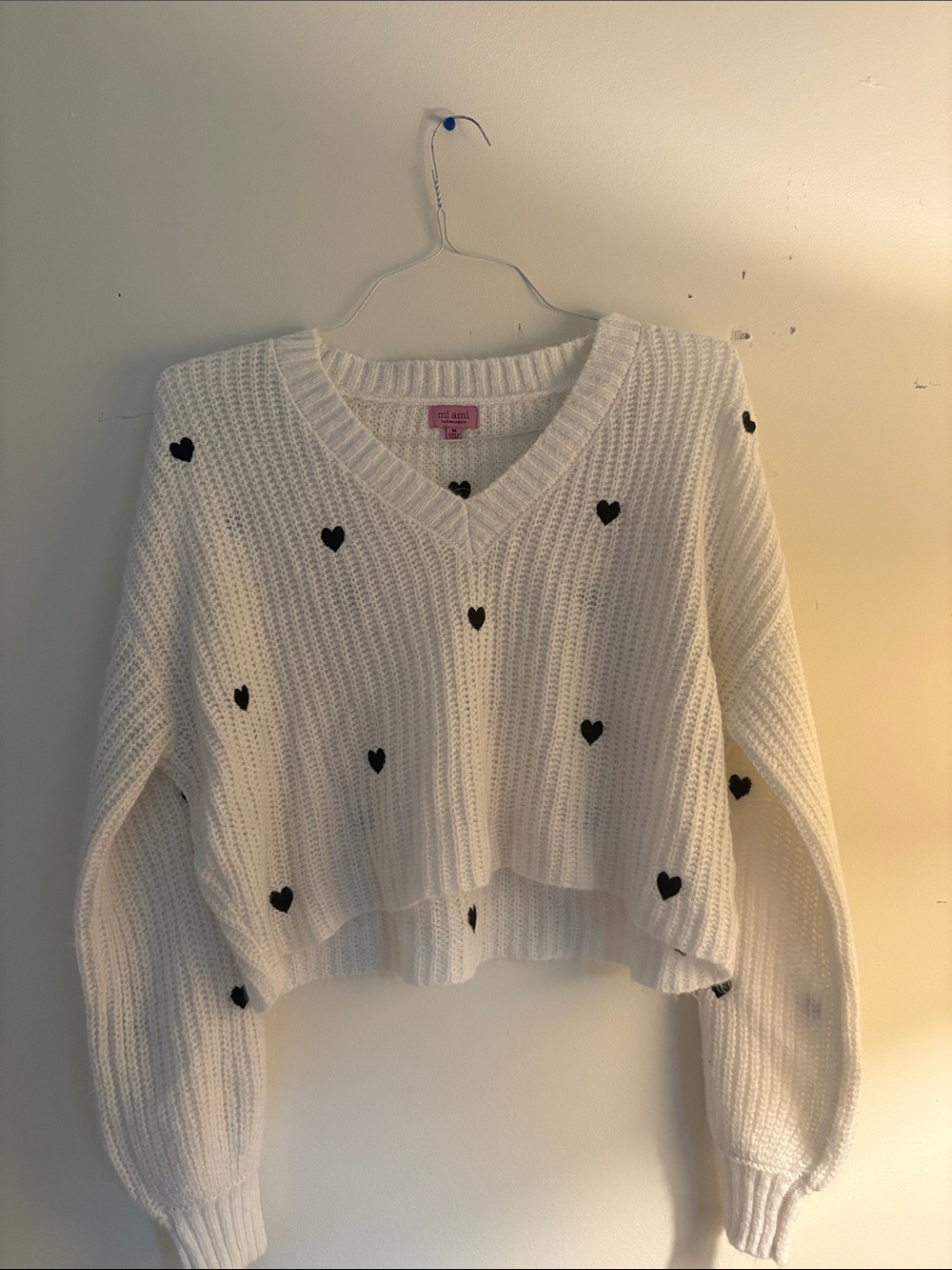 Miami Cream V-Neck Sweater with Black Heart Pattern
